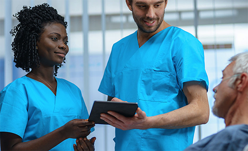 Technicians caring for patient