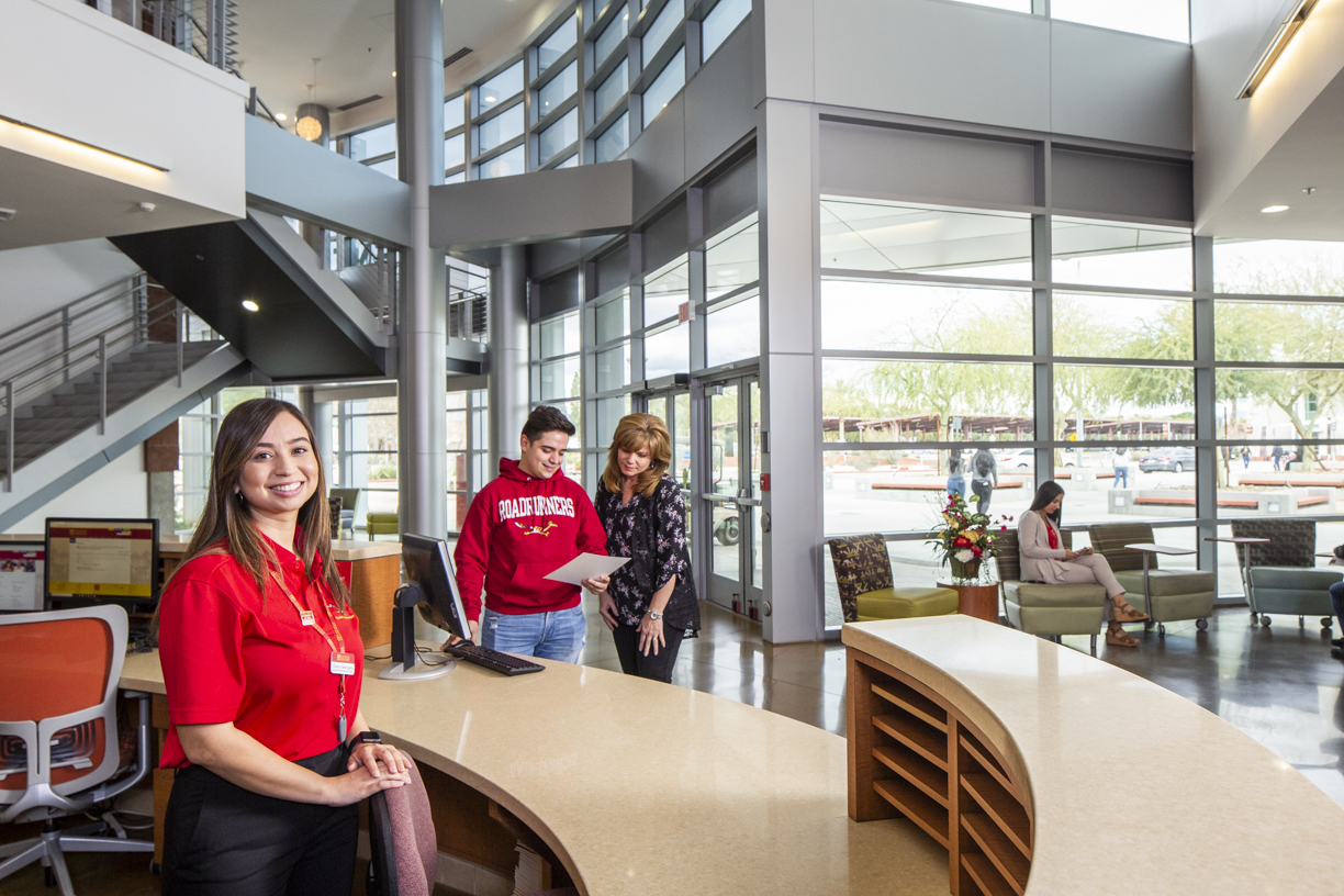 Student and Staff at Cravens Front Desk